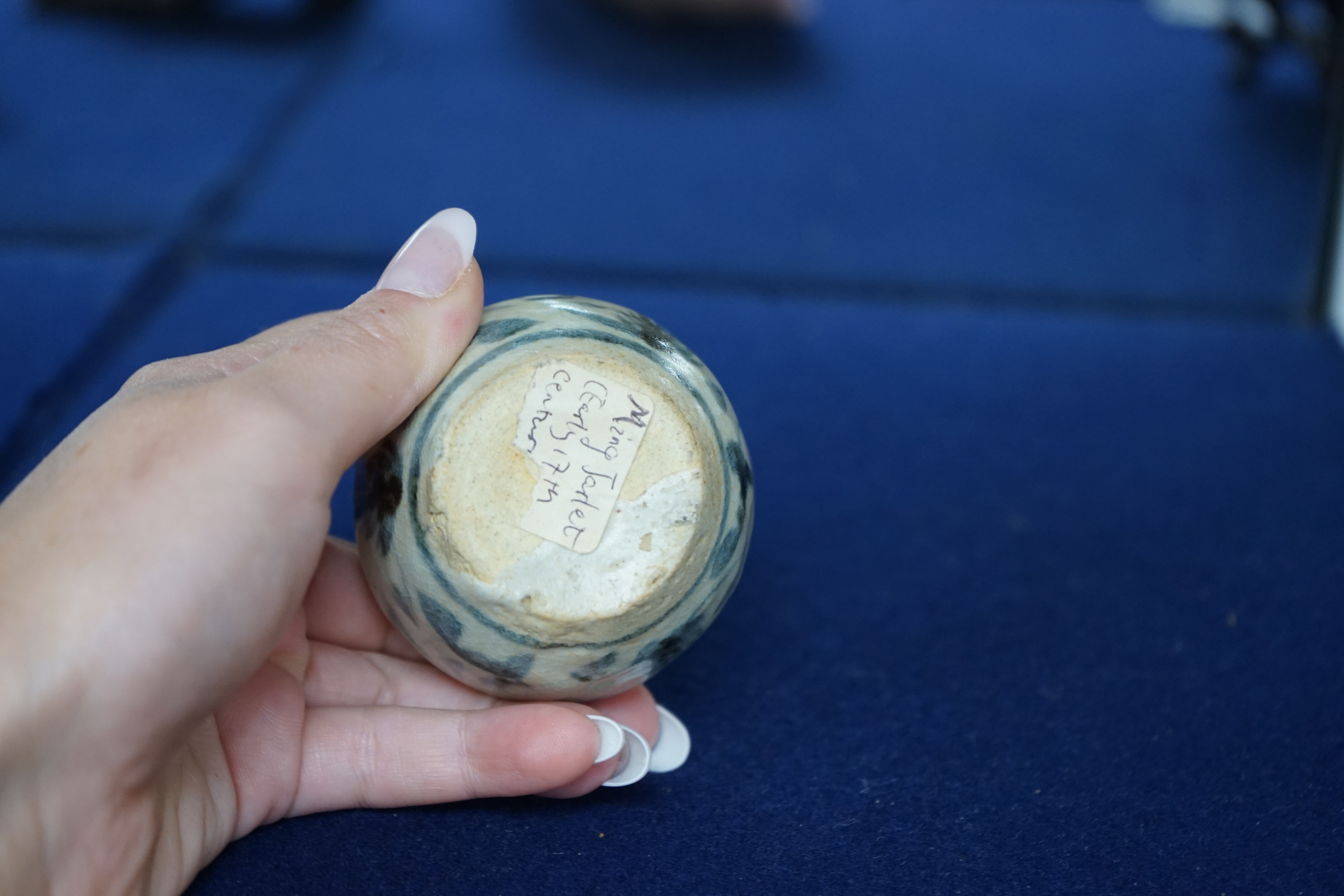 A Chinese blue and white jarlet and a tang dynasty glazed jarlet, 9cm. Condition - commensurate with age